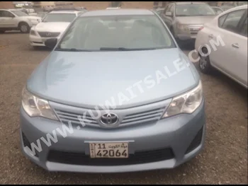 تويوتا  جي ال  كامري  2014  59,000  سيدان  اتوماتك  4  مخمل  دفع أمامي  ازرق  بنزين