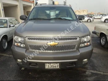 Chevrolet  LT  Tahoe  2012  124,000  SUV  Automatic  8  Cloth  4WD  Gold  Gasoline