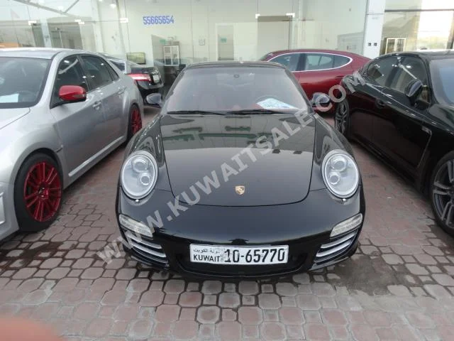 بورش  كاريرا  911  2011  117,000  كوبيه \ سبورت  اتوماتك  6  جلد  دفع خلفي  أسود  بنزين