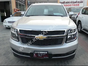 Chevrolet  LS  Tahoe  2015  65,000  SUV  Automatic  8  Cloth  4WD  Silver  Gasoline