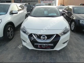 Nissan  Maxima  2016  13,000  Sedan  Automatic  6  Cloth  RWD  White  Gasoline