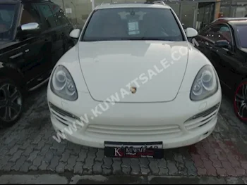 بورش  اس  كيان  2011  18,000  اس يو في  اتوماتك  8  جلد  دفع خلفي  أبيض  بنزين