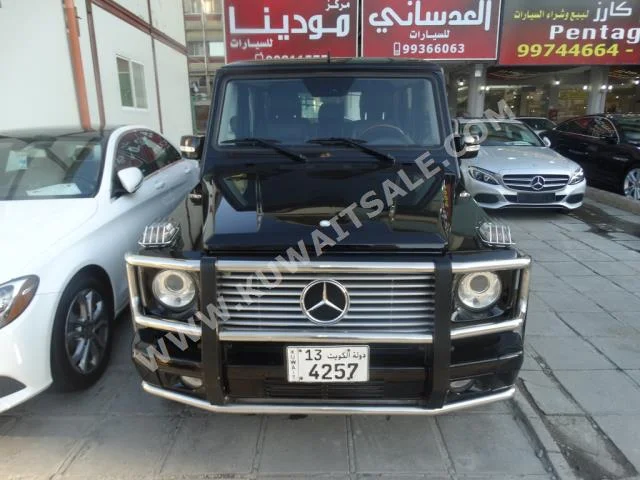 Mercedes-Benz  55 AMG  G-Class  2008  100,000  SUV  Automatic  8  Leather  4WD  Black  Gasoline