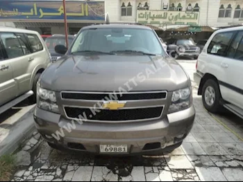 Chevrolet  LT  Tahoe  2014  36,000  SUV  Automatic  8  Cloth  RWD  Bronze  Gasoline