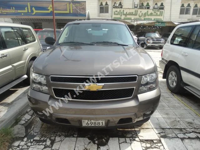 Chevrolet  LT  Tahoe  2014  36,000  SUV  Automatic  8  Cloth  RWD  Bronze  Gasoline