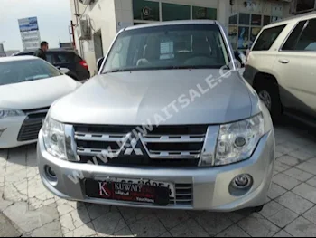 Mitsubishi  GLS  Pajero  2013  88,000  SUV  Automatic  8  Cloth  4WD  Silver  Gasoline