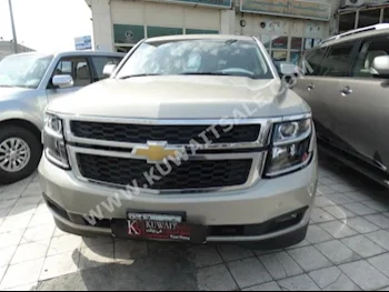 Chevrolet  LS  Tahoe  2015  72,000  SUV  Automatic  8  Leather  4WD  Gold  Gasoline