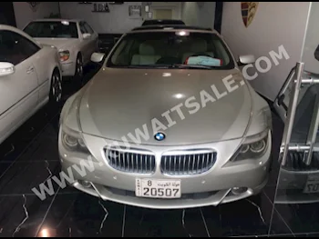 BMW  630i  6-Series  2007  120,000  Coupe / Sport  Automatic  6  Leather  RWD  Gold  Gasoline