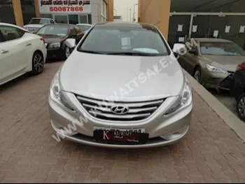 Hyundai  Sonata  2014  120,000  Sedan  Automatic  4  Cloth  FWD  White  Gasoline