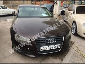 اودي  أي 5  2009  74,000  كوبيه \ سبورت  اتوماتك  6  جلد  دفع رباعي  بني  بنزين