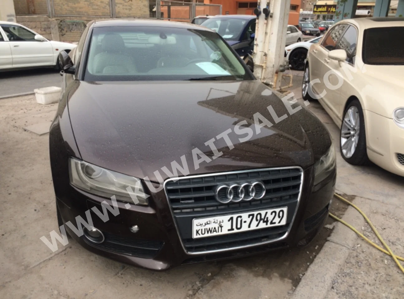 Audi  A5  2009  74,000  Coupe / Sport  Automatic  6  Leather  4WD  Brown  Gasoline