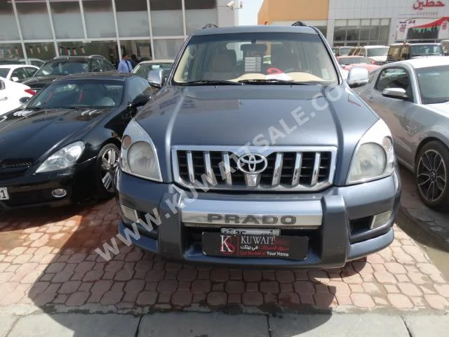 Toyota  VX  Prado  2005  370,000  SUV  Automatic  6  Cloth  4WD  Gray  Gasoline