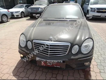 Mercedes-Benz  63 AMG  E-Class  2007  157,000  Sedan  Automatic  6  Leather  RWD  Black  Gasoline