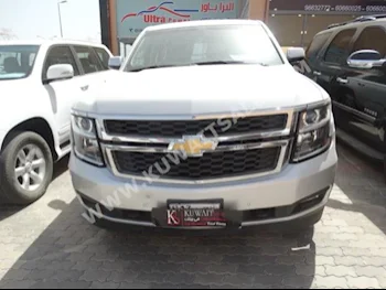 Chevrolet  LS  Tahoe  2015  65,000  SUV  Automatic  8  Cloth  4WD  Silver  Gasoline