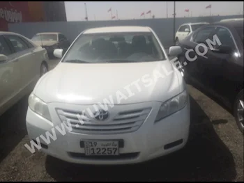 Toyota  GL  Camry  2010  187,000  Sedan  Automatic  4  Cloth  FWD  White  Gasoline
