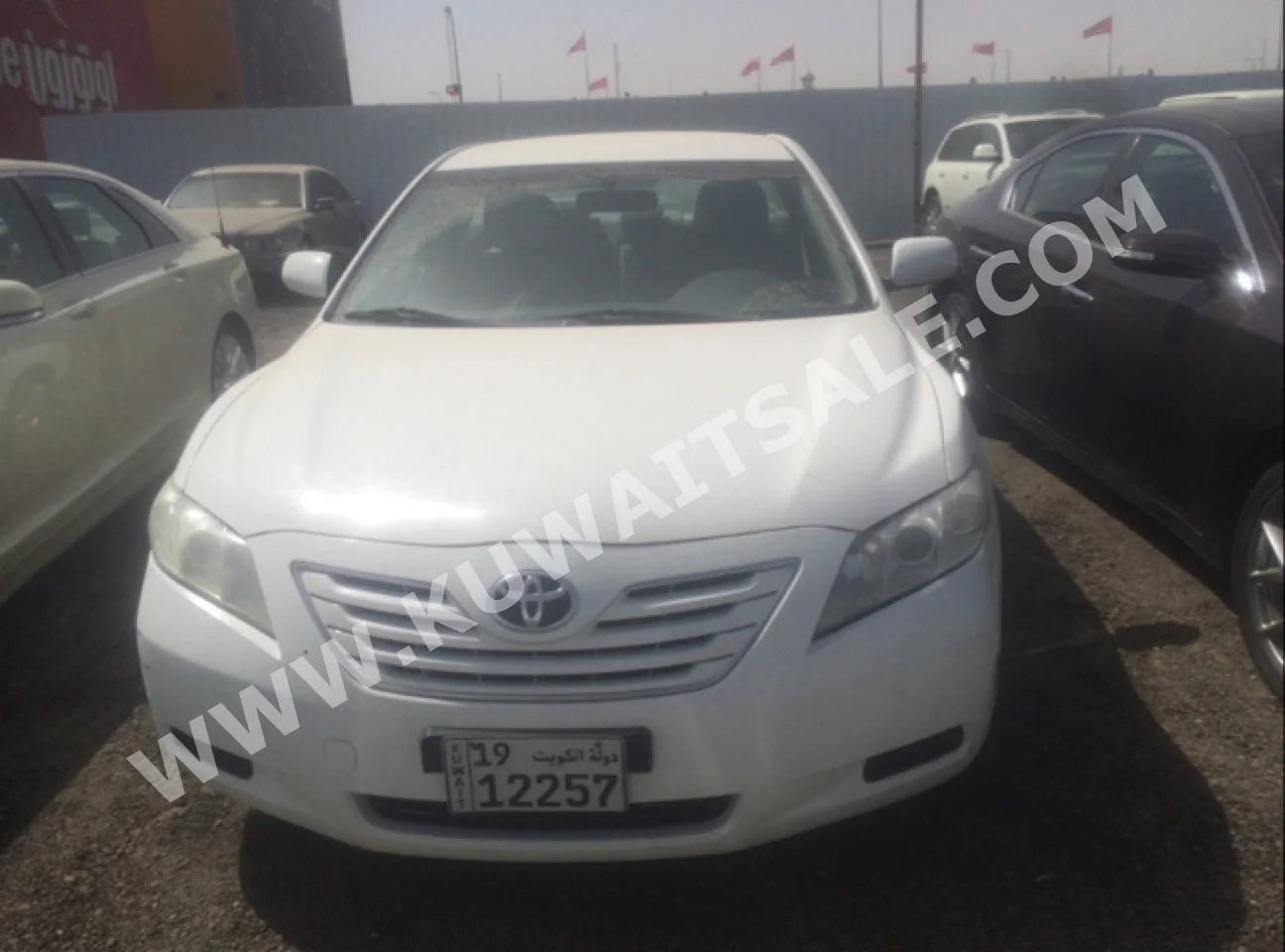 Toyota  GL  Camry  2010  187,000  Sedan  Automatic  4  Cloth  FWD  White  Gasoline