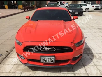 فورد  جي تي  موستانغ  2015  40,000  كوبيه \ سبورت  اتوماتك  8  جلد  دفع خلفي  برتقالي  بنزين