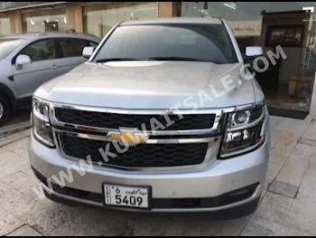 Chevrolet  LS  Tahoe  2015  80,000  SUV  Automatic  8  Leather  4WD  Dark Gray  Gasoline