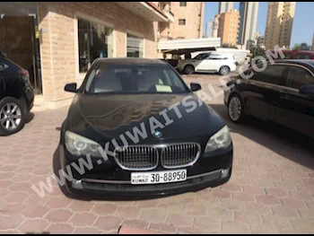 BMW  750 i  7-Series  2009  92,000  Sedan  Automatic  8  Leather  RWD  Black  Gasoline
