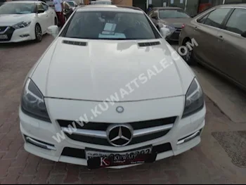 Mercedes-Benz  250  SLK-Class  2013  60,000  Coupe / Sport  Automatic  6  Leather  RWD  White  Gasoline