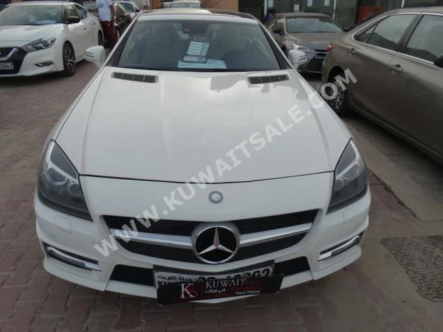 مرسيدس - بنز  250  اس ال كيه - كلاس  2013  60,000  كوبيه \ سبورت  اتوماتك  6  جلد  دفع خلفي  أبيض  بنزين