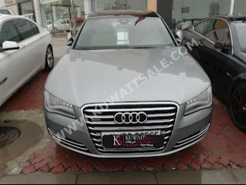 اودي  أي 8  2008  90,000  سيدان  اتوماتك  6  جلد  دفع خلفي  رمادي  بنزين
