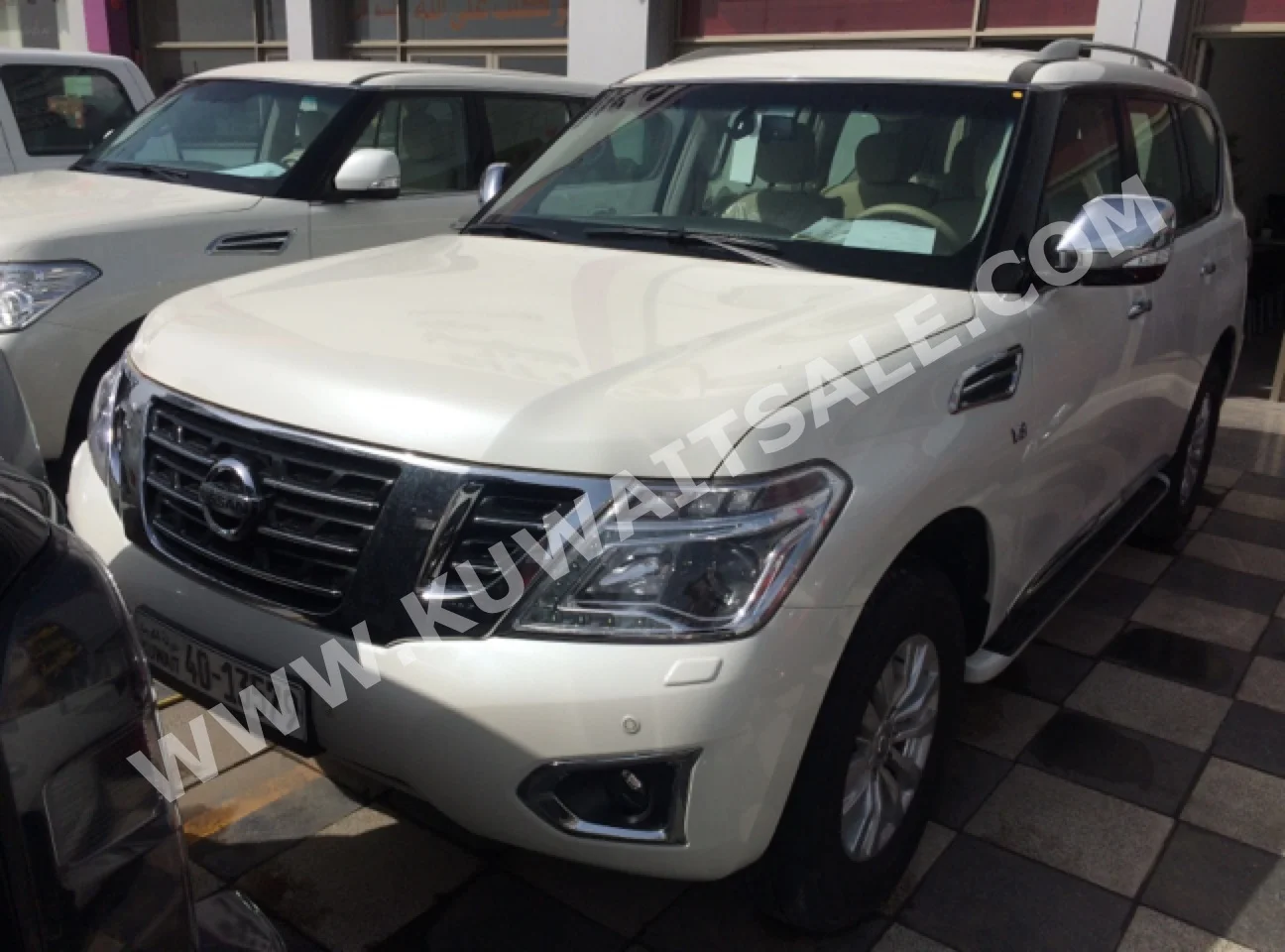 Nissan  SE  Patrol  2016  32,000  SUV  Automatic  8  Cloth  4WD  White  Gasoline