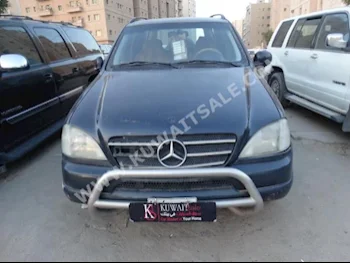 مرسيدس - بنز  320  ام ال - كلاس  1999  310,000  اس يو في  عادي  6  جلد  دفع رباعي  أزرق غامق  بنزين