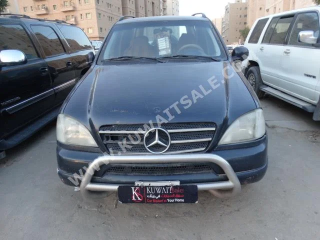 مرسيدس - بنز  320  ام ال - كلاس  1999  310,000  اس يو في  عادي  6  جلد  دفع رباعي  أزرق غامق  بنزين