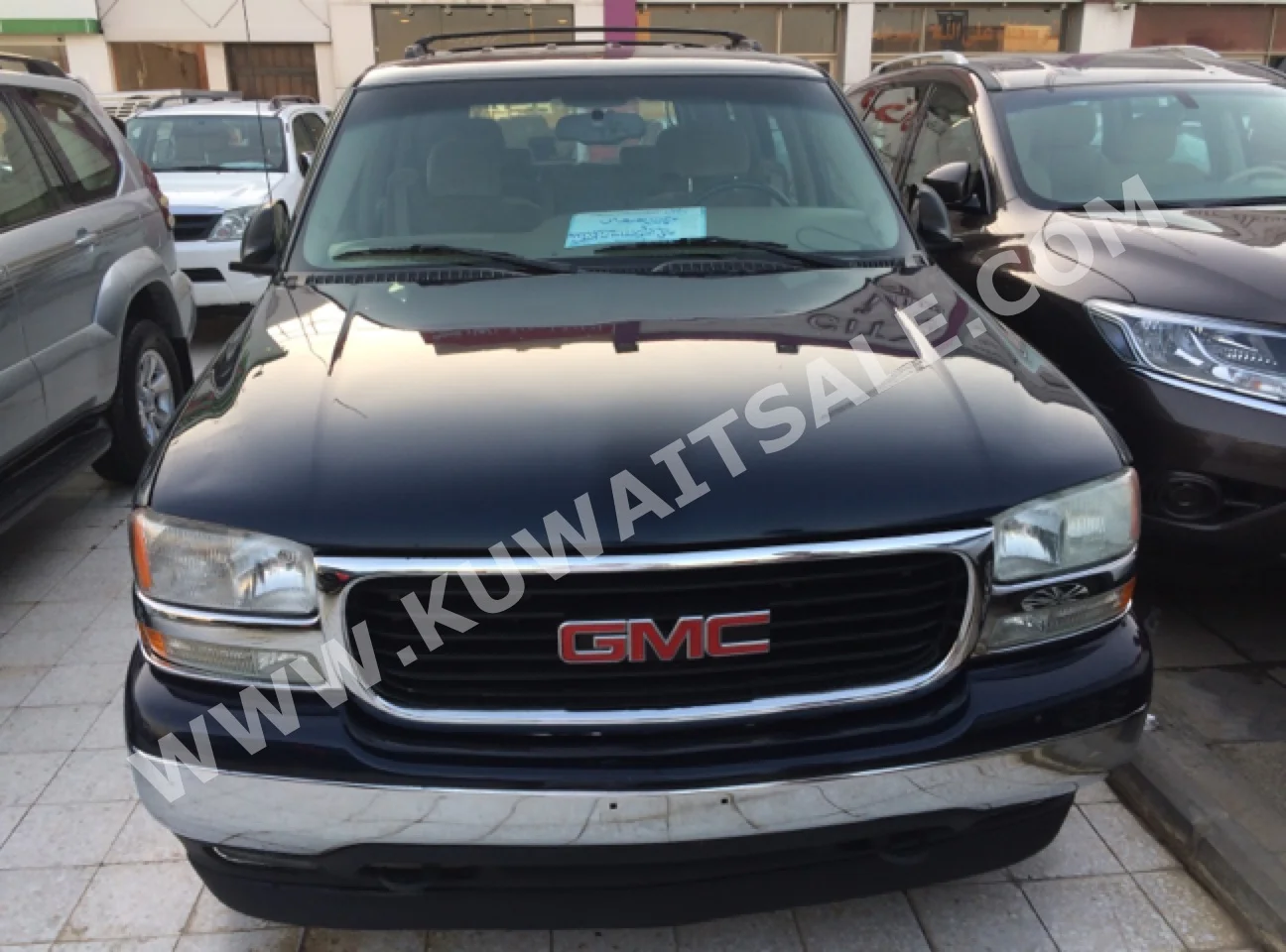 GMC  Yukon  2005  176,000  SUV  Automatic  8  Cloth  RWD  Blue  Gasoline