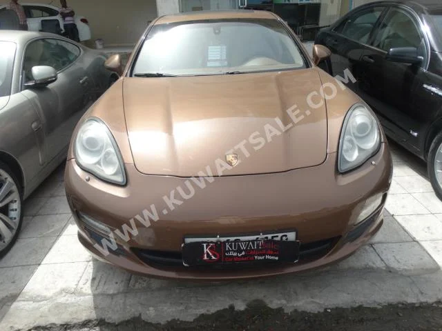 Porsche  S  Panamera  2011  158,000  Sedan  Automatic  6  Leather  RWD  Brown  Gasoline