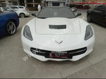 شفروليه  كورفيت  2014  70,000  كوبيه \ سبورت  اتوماتك  8  جلد  دفع خلفي  أبيض  بنزين