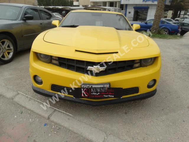 Chevrolet  RS  Camaro  2012  70,000  Coupe / Sport  Automatic  6  Leather  RWD  Yellow  Gasoline