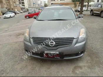 نيسان  3.5  ألتيما  2009  100,000  سيدان  اتوماتك  4  مخمل  دفع أمامي  رمادي  بنزين