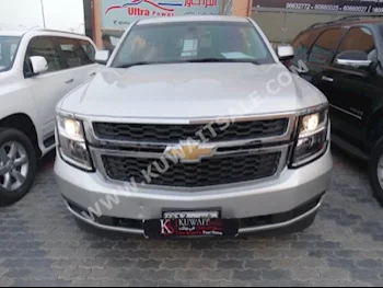 Chevrolet  LS  Tahoe  2015  60,000  SUV  Automatic  8  Cloth  4WD  Silver  Gasoline