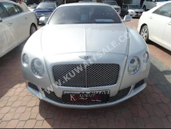 Bentley  GT Speed  2013  47,000  Coupe / Sport  Automatic  12  Leather  RWD  Silver  Gasoline