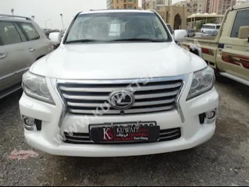 لكزس  570  ال اكس  2014  93,000  اس يو في  اتوماتك  8  جلد  دفع رباعي  أبيض  بنزين