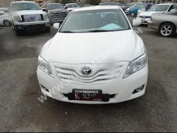 Toyota  GL  Camry  2007  110,000  Sedan  Automatic  4  Cloth  FWD  White  Gasoline
