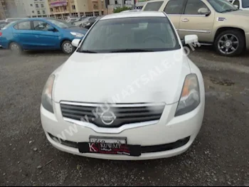 Nissan  2.5 S  Altima  2009  91,000  Sedan  Automatic  4  Cloth  FWD  White  Gasoline
