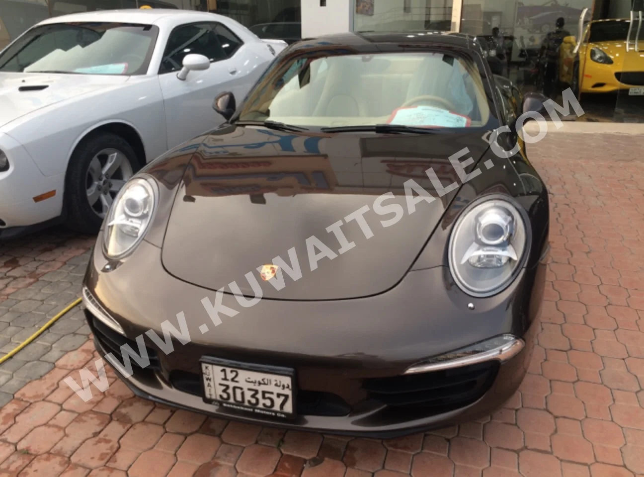 Porsche  Carrera  2014  44,000  Coupe / Sport  Automatic  6  Leather  RWD  Brown  Gasoline