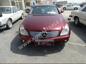 Mercedes-Benz  350  CLS-Class  2005  200,000  Sedan  Automatic  6  Leather  RWD  Dark Red  Gasoline