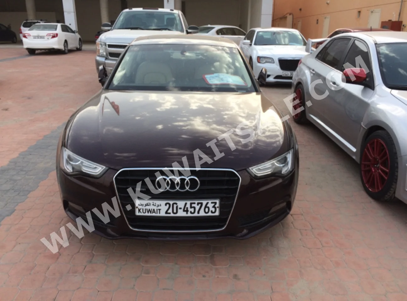 Audi  2.0 T  A5  2013  45,000  Sedan  Automatic  6  Leather  4WD  Brown  Gasoline