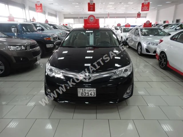 Toyota  GLX  Camry  2015  32,000  Sedan  Automatic  4  Cloth  FWD  Black  Gasoline
