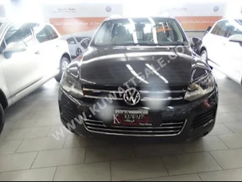 Volkswagen  Touareg  2014  61,000  SUV  Automatic  6  Leather  RWD  Gray  Gasoline