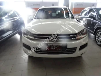 Volkswagen  Touareg  2015  107,000  SUV  Automatic  6  Leather  RWD  White  Gasoline