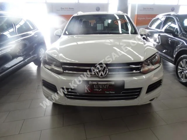 Volkswagen  Touareg  2015  107,000  SUV  Automatic  6  Leather  RWD  White  Gasoline