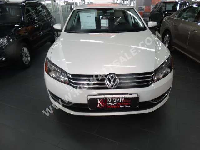 Volkswagen  Passat  2016  50,000  Sedan  Automatic  4  Cloth  FWD  White  Gasoline
