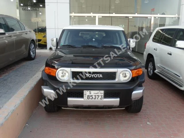 Toyota  GXR  FJ Cruiser  2010  226,000  SUV  Automatic  6  Cloth  4WD  Black  Gasoline