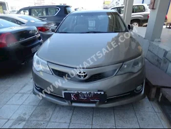 Toyota  GLX  Camry  2013  120,000  Sedan  Automatic  4  Cloth  FWD  Gold  Gasoline