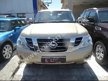 Nissan  SE  Patrol  2013  90,000  SUV  Automatic  8  Cloth  4WD  Gold  Gasoline